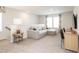 Upstairs loft living space includes a comfy couch and desk area, perfect for work or relaxation at 837 Ottawa Dr, Garner, NC 27529