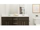 Bathroom with dual sink vanity, decorative fixtures, and modern design at 84 Blossom Field Way, Angier, NC 27501