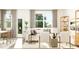 Comfortable living space featuring neutral-toned furniture and ample natural light at 84 Blossom Field Way, Angier, NC 27501