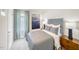 Comfortable bedroom with a plush gray bed, stylish decor, and soft lighting for a restful atmosphere at 841 Ottawa Dr, Garner, NC 27529