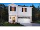 Rendering of a two-story home, showcasing its white exterior, black shutters, and landscaped front yard at 841 Ottawa Dr, Garner, NC 27529
