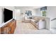 Cozy loft featuring a comfortable sectional sofa, stylish decor, and a view of the outdoors at 841 Ottawa Dr, Garner, NC 27529