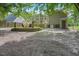 Lovely backyard featuring a deck, screened porch, and lush landscape at 847 E Maple Ln, Fuquay Varina, NC 27526