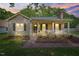 Charming one-story home featuring a welcoming front porch, neutral siding, and lush landscaping, set on a beautiful lot at 847 E Maple Ln, Fuquay Varina, NC 27526