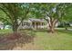 Charming one-story home featuring a welcoming front porch, neutral siding, and lush landscaping, set on a beautiful lot at 847 E Maple Ln, Fuquay Varina, NC 27526
