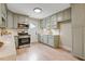 Charming kitchen boasts modern appliances, sleek countertops, and ample cabinet space at 847 E Maple Ln, Fuquay Varina, NC 27526