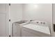 Laundry room features a washing machine and a dryer at 847 E Maple Ln, Fuquay Varina, NC 27526