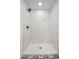 White tile stand up shower with black hardware at 847 E Maple Ln, Fuquay Varina, NC 27526