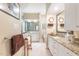 Bright bathroom with double vanities, granite counters, and a glass-enclosed shower for a spa-like feel at 850 N Langdon, Pittsboro, NC 27312