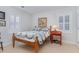 Cozy bedroom features natural light and traditional furnishings at 850 N Langdon, Pittsboro, NC 27312