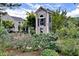 Exterior view of the coffee shop with outdoor seating and lush landscaping at 850 N Langdon, Pittsboro, NC 27312