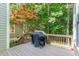 Outdoor deck with leafy view perfect for grilling and outdoor enjoyment at 850 N Langdon, Pittsboro, NC 27312