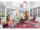 Open living area featuring a soaring ceiling, second story landing, and built-in bookshelves on the right at 850 N Langdon, Pittsboro, NC 27312
