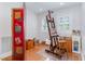 Bright studio features a hardwood floor, easel, and natural light at 850 N Langdon, Pittsboro, NC 27312