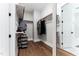 Walk-in closet with wood floors and custom built-in shelving for optimal storage at 91 Ivy Ridge Rd, Chapel Hill, NC 27516