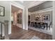 Stylish dining room featuring wood floors, a large table, and decorative wall art at 91 Ivy Ridge Rd, Chapel Hill, NC 27516