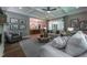 Comfortable living room with a coffered ceiling, plush seating, and easy access to the kitchen area at 91 Ivy Ridge Rd, Chapel Hill, NC 27516