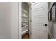 Pantry with white shelving provides ample storage space and organizational solutions at 91 Ivy Ridge Rd, Chapel Hill, NC 27516