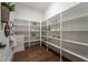 Spacious walk-in pantry with floor-to-ceiling shelves offering ample storage space at 91 Ivy Ridge Rd, Chapel Hill, NC 27516