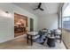 Cozy screened-in porch featuring stylish furniture and an open view into the dining area at 91 Ivy Ridge Rd, Chapel Hill, NC 27516