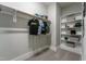 Neatly organized walk-in closet with clothing rack, shelving, and carpeted floors at 91 Ivy Ridge Rd, Chapel Hill, NC 27516