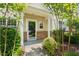 Inviting front entrance with stone accents and well-maintained landscaping at 1003 Crimson Dr, Durham, NC 27713