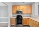 Spacious kitchen with stainless steel appliances and ample cabinet storage at 1003 Crimson Dr, Durham, NC 27713
