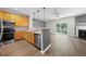 Modern kitchen with stainless steel appliances and seamless flow to the living area at 1003 Crimson Dr, Durham, NC 27713