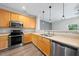 Well-equipped kitchen featuring stainless steel appliances and ample counter space at 1003 Crimson Dr, Durham, NC 27713