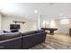 Finished basement with wood floors, pool table, and a couch at 1005 Temple St, Raleigh, NC 27609