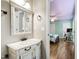 Bathroom with white vanity and access to bedroom at 1005 Temple St, Raleigh, NC 27609