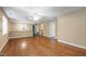 Expansive bonus room featuring hardwood flooring, fan, and natural light at 1005 Temple St, Raleigh, NC 27609