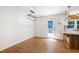 Bright dining area with hardwood floors and a door leading to a deck at 1005 Temple St, Raleigh, NC 27609