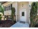 Close up of the front entrance featuring a welcoming door and well-maintained landscaping at 1005 Temple St, Raleigh, NC 27609