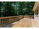 Exterior wooden deck overlooking lush, green trees at 1005 Temple St, Raleigh, NC 27609