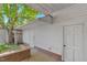 View of the house from the back patio area showing exterior access doors at 102 S College Ave, Kenly, NC 27542