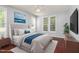 Comfortable bedroom with a large bed, soft lighting, and tranquil decor at 102 Winged Foot Ct, Mebane, NC 27302