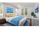 Comfortable bedroom featuring a king-sized bed, hardwood floors, and bright windows at 102 Winged Foot Ct, Mebane, NC 27302