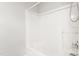 A clean, bright shower featuring white tile and brushed nickel hardware at 102 Winged Foot Ct, Mebane, NC 27302