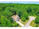 Aerial view showcasing a house with manicured lawn at 1033 Cabin Hill Way, Garner, NC 27529