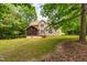 View of the home's backyard and screened-in porch at 1033 Cabin Hill Way, Garner, NC 27529
