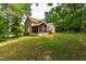 Exterior rear view of a two-story home with screened-in porch at 1033 Cabin Hill Way, Garner, NC 27529