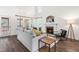 Bright living room featuring a cozy fireplace, hardwood floors, and lots of natural light at 1033 Cabin Hill Way, Garner, NC 27529