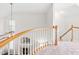 A loft with a view of the fireplace and ceiling fan at 1033 Cabin Hill Way, Garner, NC 27529
