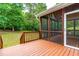Screened in porch and a wood deck with backyard views at 1033 Cabin Hill Way, Garner, NC 27529