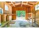 View of a shed interior with workbench and natural light at 1033 Cabin Hill Way, Garner, NC 27529