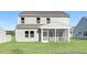 The home boasts a screened-in porch and a spacious backyard at 105 Mable Court # 10, Lillington, NC 27546