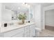 Elegant bathroom with dual sinks, a large mirror, and modern fixtures at 105 Mable Court # 10, Lillington, NC 27546