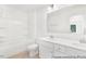 Bright bathroom with a bathtub, shower, dual sink vanity, and modern finishes at 105 Mable Court # 10, Lillington, NC 27546