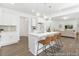 Kitchen island with barstool seating and views into the living room at 105 Mable Court # 10, Lillington, NC 27546